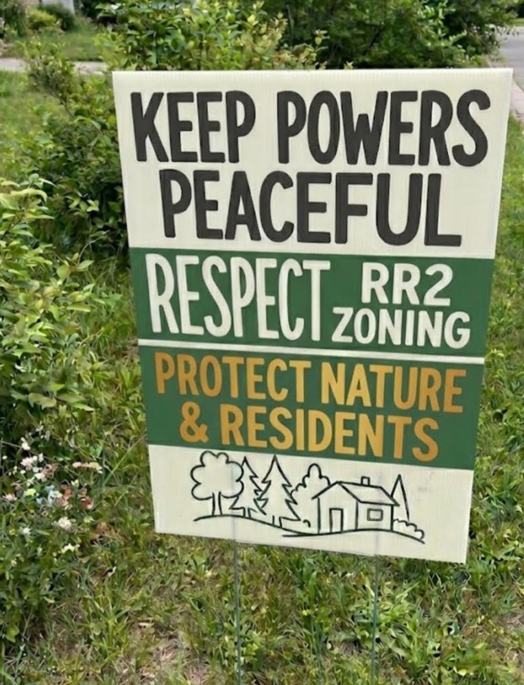 Neighborhood sign opposing the proposed facility